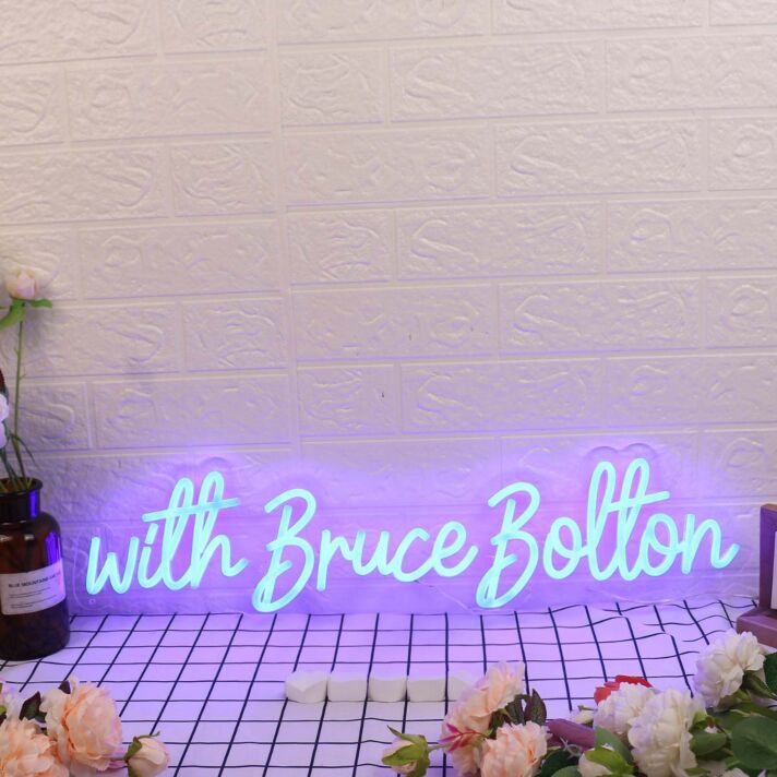 With Bruce Bolton Blue Neon Sign