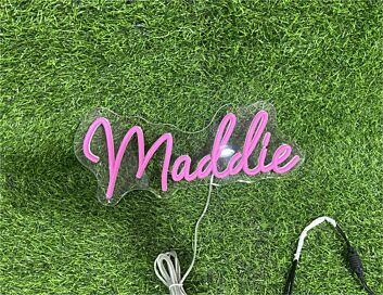 Add a Personal Touch to Your Weddings, Parties, and Home Décor with the Custom Name Maddie LED Neon Sign.
