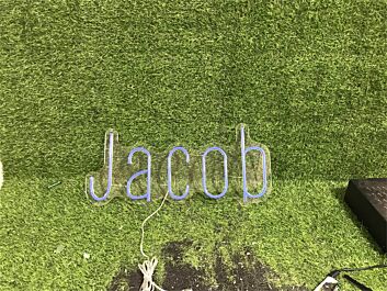 Elevate your wedding, bar ambiance, or office space with the Personalize Custom Jacob LED Neon Sign.