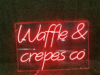 Brighten Your Breakfast Nook, Café, or Dessert Shop with the Waffle And Crepes Co LED Neon Sign.