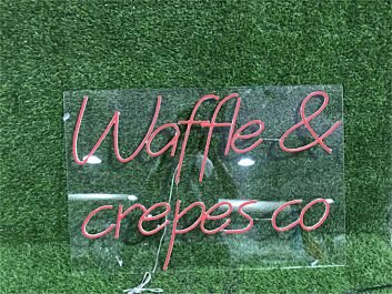 Brighten Your Breakfast Nook, Café, or Dessert Shop with the Waffle And Crepes Co LED Neon Sign.