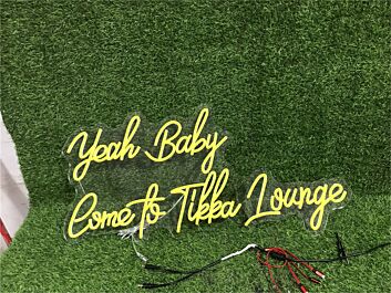 Brighten Your Wedding, Bar, or Office Ambiance with the Yeah Baby Custom LED Neon Sign.