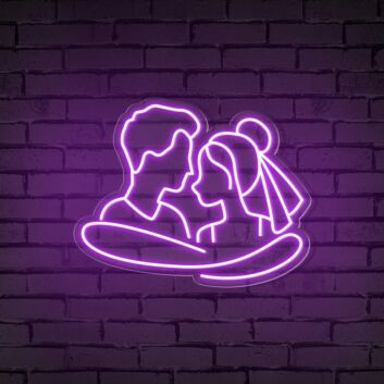 Add a Romantic Glow to Your Bedroom, Wedding, or Anniversary Celebration with the Cuddling Couple Shape Neon Sign.