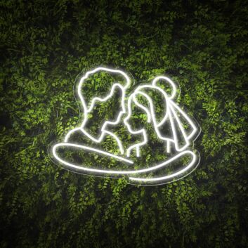 Add a Romantic Glow to Your Bedroom, Wedding, or Anniversary Celebration with the Cuddling Couple Shape Neon Sign.