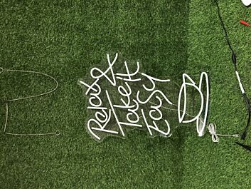 Light Up Your Space with Relax And Take It Easy Yellow LED Neon Sign - Perfect for Home Decor, Office Vibes, and Chill Bar Atmospheres.