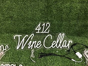 Enhance Your Wine Cellar, Bar, or Wedding Ambiance with the 412 Wine Cellar Yellow Neon Sign.