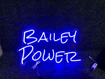 Elevate Your Bar, Office, or Wedding Ambiance with the Bailey Power Blue LED Neon Sign.