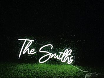 Elevate your office, wedding, or bar ambiance with The Smiths White LED Neon Sign.