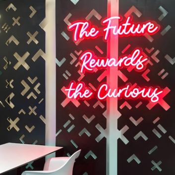 &#39;The Future Rewards The Curious &#39; Neon Sign