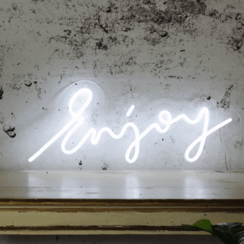 &#39;Enjoy&#39; LED neon sign