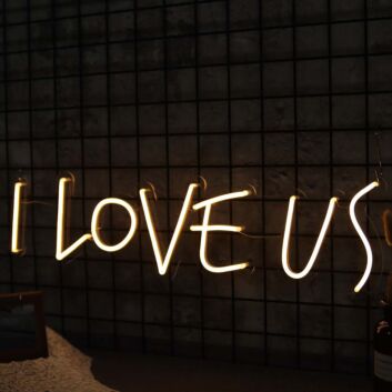Love Us Neon Sign