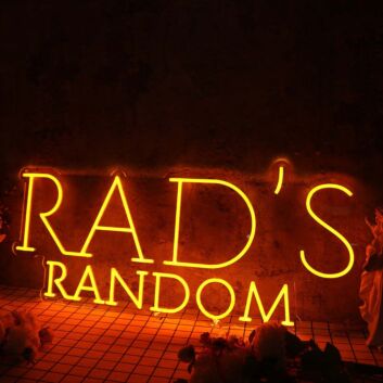 Rad&#039;s Random Orange Neon Sign