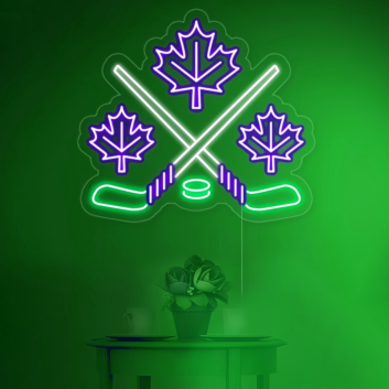 Maple leaves with crossed hockey sign in neon light