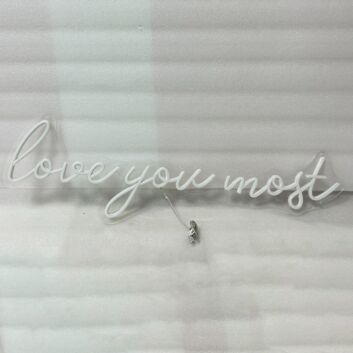 &#39;Love you most&#39; neon sign
