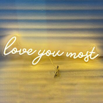 &#39;Love you most&#39; neon sign