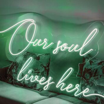 ”Our soul lives here“ neon sign