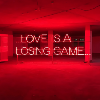 Love is a Losing Game: Embrace the Bittersweet with Neon Ambiance
