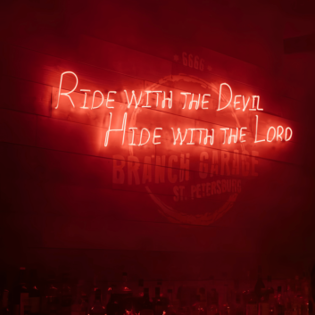 Ride with the Devil, Hide with the Lord: Captivating Neon Art Sign!