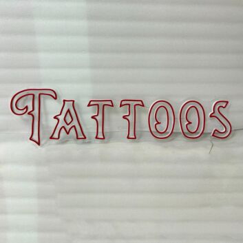 Tattoos Illuminate Your Space with Neon Art