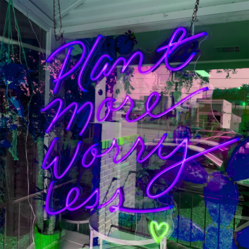 Plant More Worry Less: Illuminate Your Space with Neon Relaxation