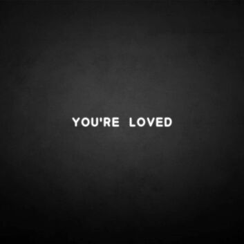&#39;You&#039;re loved&#39; neon sign