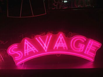 Savage Neon Sign for Bold and Playful Spaces
