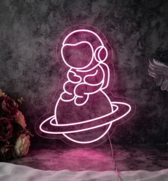Astronaut Sitting On Planet Neon Sign for Space Enthusiasts