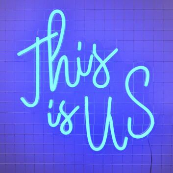 This Is Us Neon Sign for family-oriented living rooms