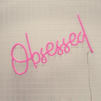 Obsessed Neon Sign adds fun to playful bedroom decor