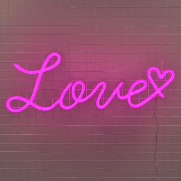 Love Heart Neon Sign creates a romantic atmosphere