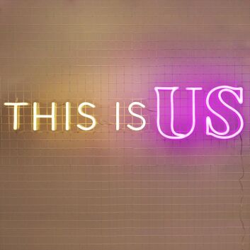 This Is Us Neon Sign for family-centered living rooms