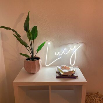 Brighten up your bar, cafe, or wedding ambiance with the Name Lucy LED Neon Sign.