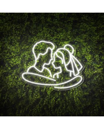 Add a Romantic Glow to Your Bedroom, Wedding, or Anniversary Celebration with the Cuddling Couple Shape Neon Sign.