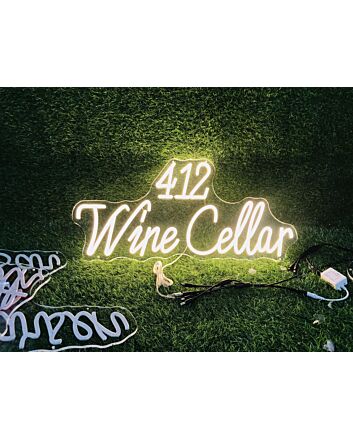 Enhance Your Wine Cellar, Bar, or Wedding Ambiance with the 412 Wine Cellar Yellow Neon Sign.