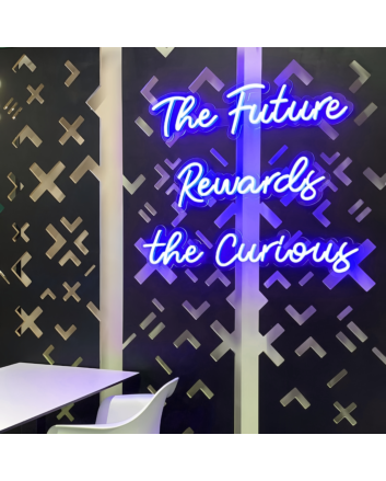 &#39;The Future Rewards The Curious &#39; Neon Sign