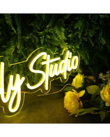 Niever Family Studio Yellow Neon Sign