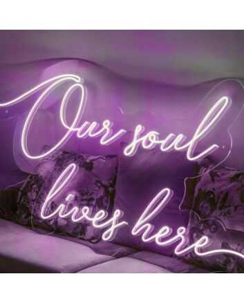 ”Our soul lives here“ neon sign