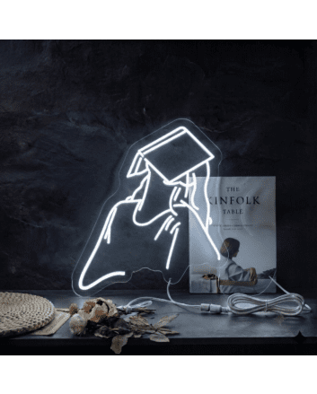 Sleeping reader neon sign