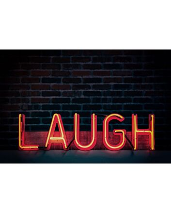 Laugh Neon Sign for Playful and Positive Spaces