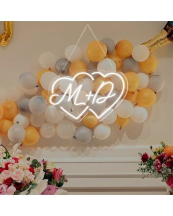 Add a Romantic Glow to Your Wedding, Anniversary, or Bedroom with the Couple Initials Heart Shapes M D Personalized LED Neon Sign.