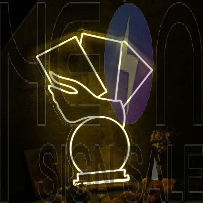 A Hand Holding Books Yellow Neon Sign