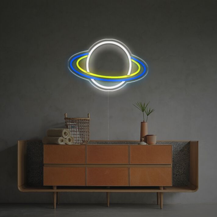 Bring cosmic charm to your home, office, or event with the Planet With Star Rings LED Neon Sign.