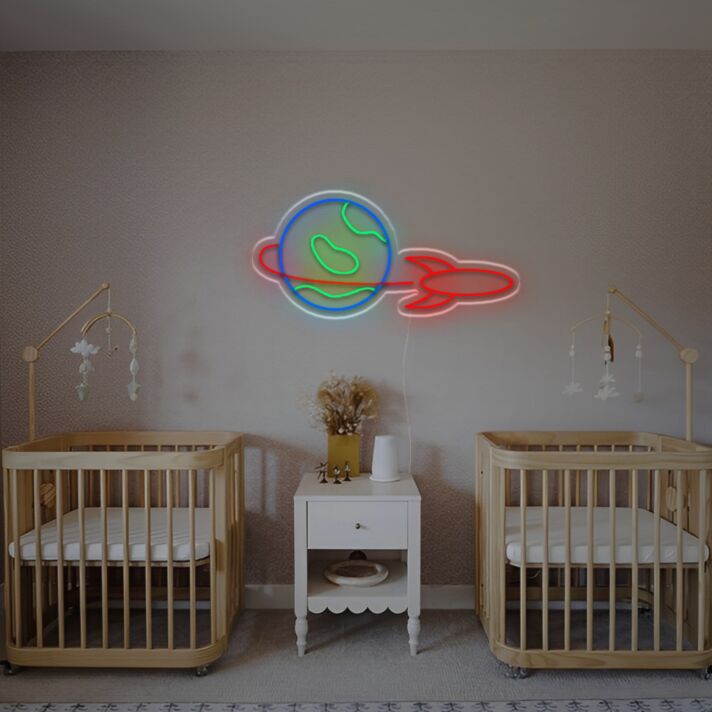 Bring Space Adventure to Your Rooms, Parties, and Workspaces with the Rocket Orbiting The Earth LED Neon Sign.