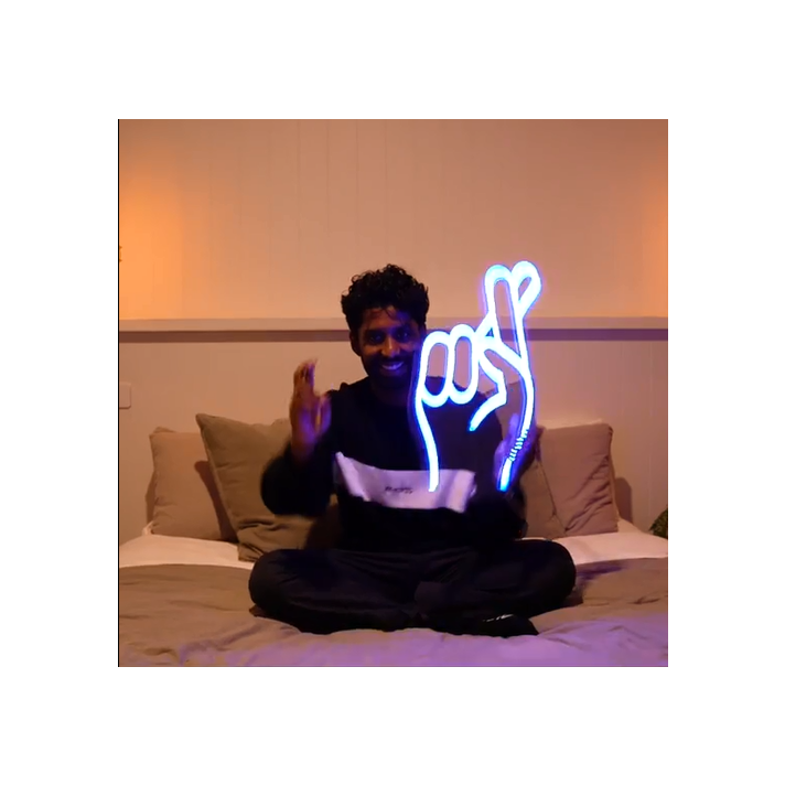 Fingers crossed neon sign