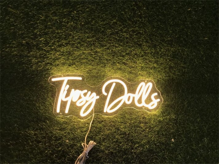 Elevate Your Bar, Event, or Boutique Decor with the Unique Charm of Tipsy Dolls Custom LED Neon Sign.