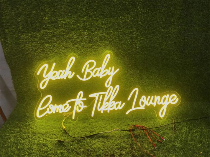 Brighten Your Wedding, Bar, or Office Ambiance with the Yeah Baby Custom LED Neon Sign.