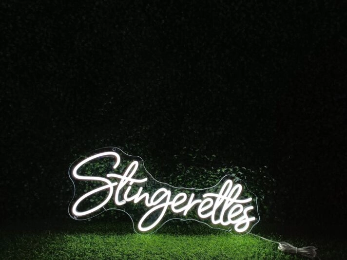 Brighten Your Space: Stingerettes White LED Neon Sign, Perfect for Home Decor, Offices, and Trendy Bars.
