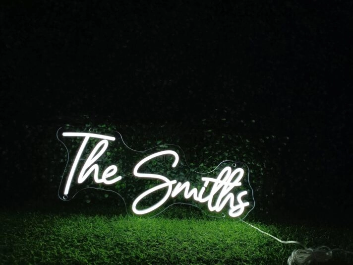Elevate your office, wedding, or bar ambiance with The Smiths White LED Neon Sign.