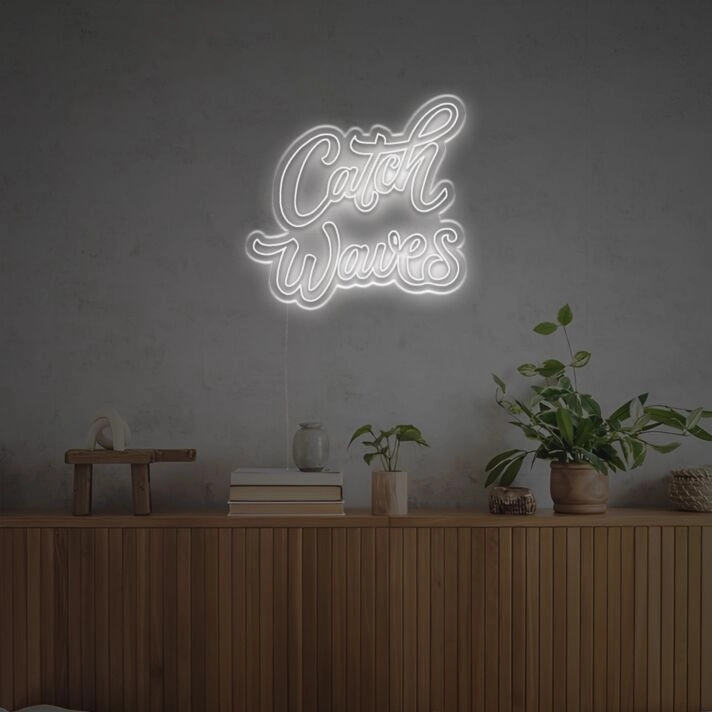 Brighten Your Beach-Themed Bar, Office, or Home Decor with the Catch Waves LED Neon Sign.