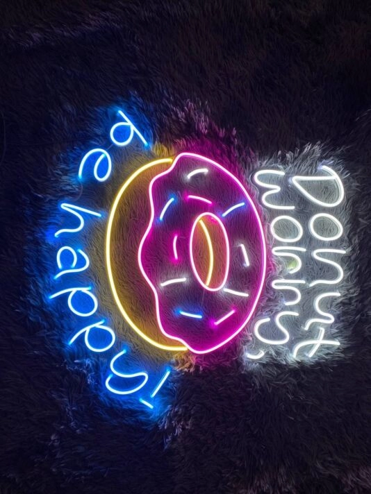 Brighten Your Bakery, Sweeten Your Home Decor, and Add a Glow to Parties with the Donut Worry Be Happy Led Neon Sign.